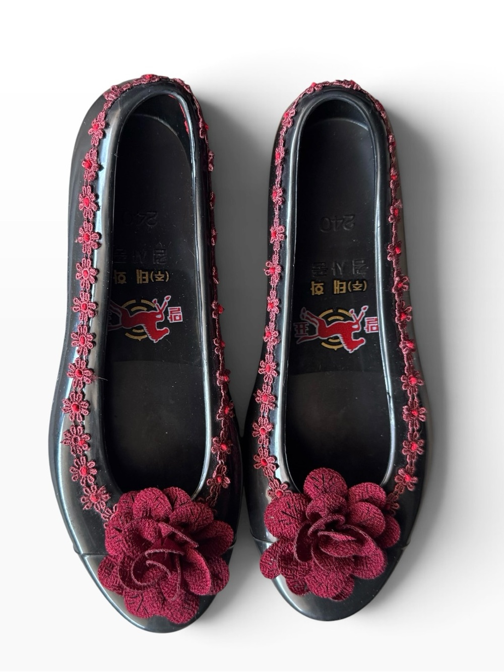 Black Floral-Trim Rubber Jelly Ballet Flats with Dark Red Rosette